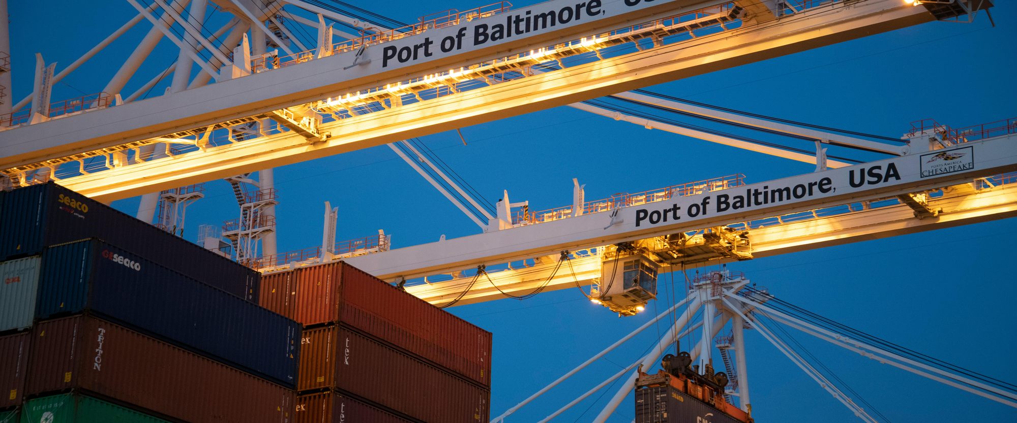 Gantry crane lifting an out-of-gauge container load