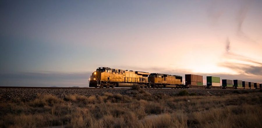 Freight train on the Trans-Caspian rail corridor at sunset